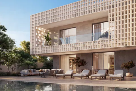 Nawayef Heights: villa with a patterned screen facade above its pool terrace, developer render