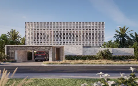 Nawayef Homes: villa with a screened upper floor behind a landscaped street edge, developer render