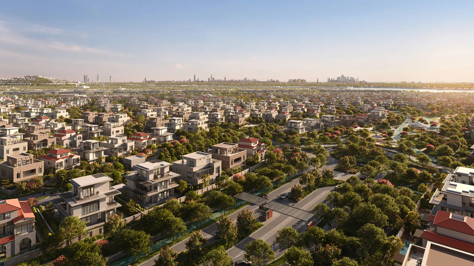 Wadeem: aerial view over the villa plots and tree-lined streets, developer render