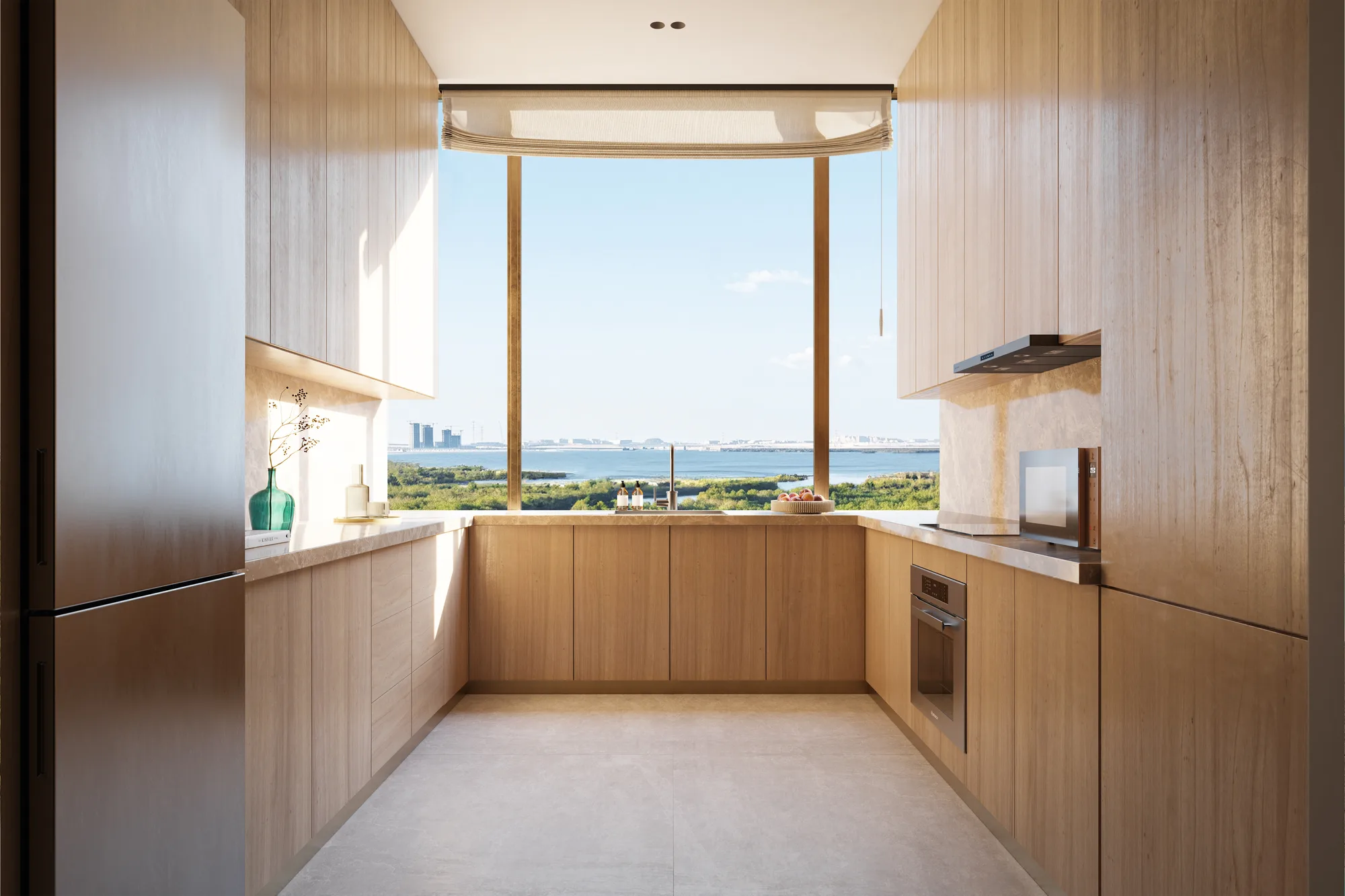 A light-oak kitchen with a window over the water and mangroves