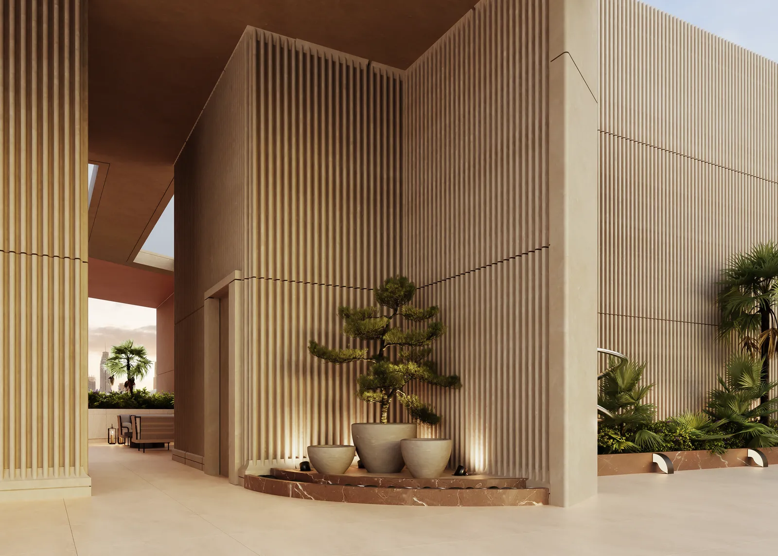 A terrace seating area between fluted columns, with a planter, lanterns and low seating